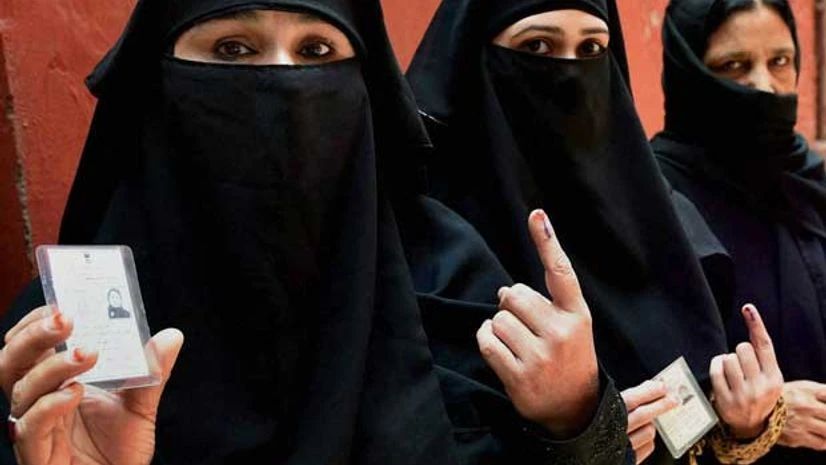 Muslim women after voting at a polling booth in Ballimaran Ward during MCD by-elections in New Delhi on Sunday, May 15, 2016 PTI Muslim women after voting at a polling booth in Ballimaran Ward during MCD by-elections in New Delhi on Sunday, May 15, 2016 PTI