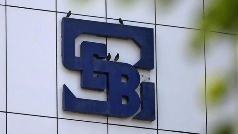 Birds rest on the logo of the Securities and Exchange Board of India (SEBI), India's market regulator, installed on the facade of its head office building in Mumbai Birds rest on the logo of the Securities and Exchange Board of India (SEBI), India's market regulator, installed on the facade of its head office building in Mumbai