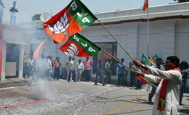 UP poll: BJP jingles to focus SP 'goondraaj', BSP 'corruption' BJP workers celebrate party victory in Assam 2016 polls