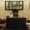 An employee of Lupin Limited works at a reception at their headquarters in Mumbai