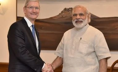 Apple's India pie needs local flavour Apple CEO Tim Cook calls on PM Narendra Modi in New Delhi. Photo: ANI