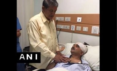 Uttarakhand CM Harish Rawat meets injured BJP MP Tarun Vijay Uttarakhand CM Harish Rawat visits injured BJP MP Tarun Vijay at the hospital. Photo: ANI