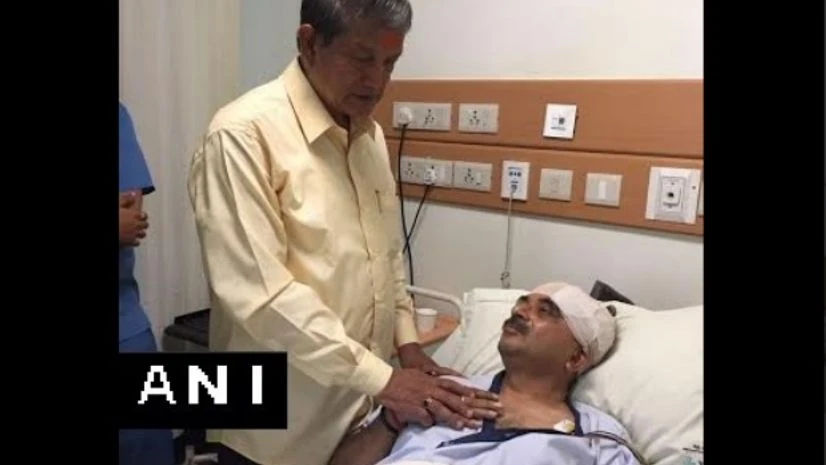 Uttarakhand CM Harish Rawat visits injured BJP MP Tarun Vijay at the hospital. Photo: ANI Harish Rawat