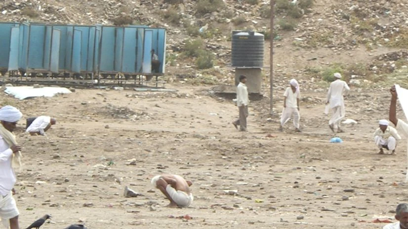 A file picture of open defecation. Photo: Wikipedia A file picture of open defecation. Photo: Wikipedia