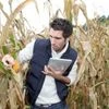 Agronomist with tablet image via Shutterstock.