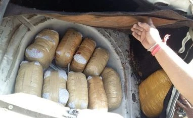 Assam cops recovers 497 kg ganja from truck, miscreants set vehicle on fire Around 700 kg ganja, worth Rs 1.5 crore was seized in Chhattisgarh