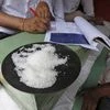 A sample of sugar crystals are seen on the desk of a trader at a wholesale market in Kolkata. Photo: Reuters