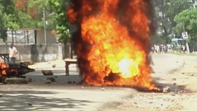 Ex-Bihar Manjhi's convoy was set on fire, while he was on his way to meet those protesting against LJP leader Sudesh Paswan's murder. Photo: ANI Ex-Bihar Manjhi's convoy was set on fire, while he was on his way to meet those protesting against LJP leader Sudesh Paswan's murder. Photo: ANI