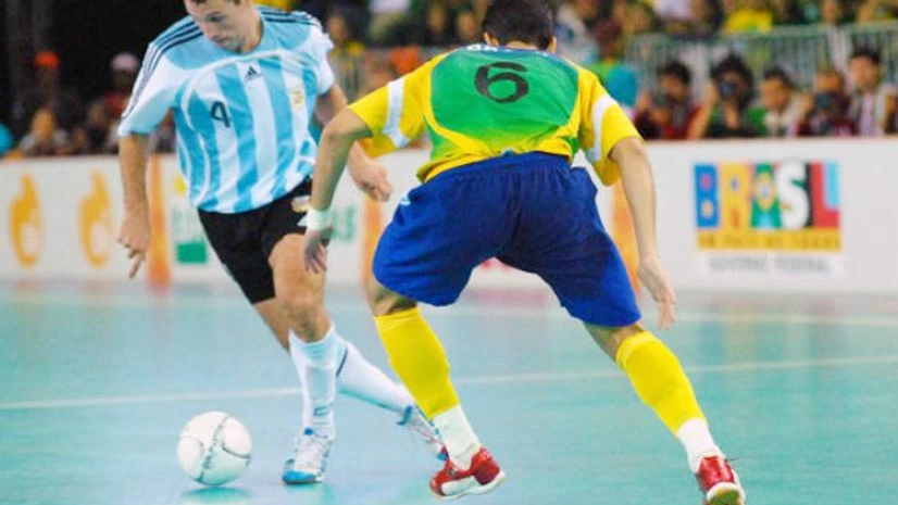 Futsal An futsal match between Brazil and Argentina. The game is a version of football played on a smaller field and mainly indoors. There are five players each side. Photo courtesy: Wikipedia