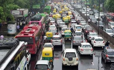 Delhi to soon have over 4K e-autos on roads, registration opens Traffic moves at a snail's pace on a street in New Delhi following rain on Monday, May 30, 2016 PTI