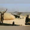 Iraqi security forces and allied Popular Mobilization forces fire artillery during fight against Islamic State militants in Fallujah, Iraq Iraqi security forces and allied Popular Mobilization forces fire artillery during fight against Islamic State militants in Fallujah, Iraq