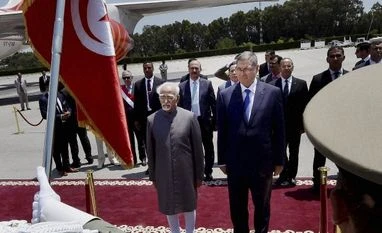 Hamid Ansari arrives in Tunisia on second leg of his two-nation trip Vice President Hamid Ansari and Tunisian Prime Minister Habib Essid during a welcome ceremony at Carthage Internatinal Airport at Tunis in Tunisia