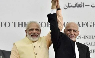Pentagon declares India as Afghanistan's most reliable partner Prime Minister Narendra Modi and Afghan President Ashraf Ghani raise each other's hands after inaugurating Afghan-India Friendship Dam in Herat, Afghanistan. PTI Photo by Kamal Kishore