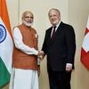 Prime Minister Narendra Modi shakes hands Switzerland's President Johann Schneider-Ammann before a meeting in Geneva, Switzerland  PTI