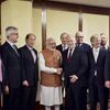 Prime Minister Narendra Modi and Switzerland's President Johann Schneider-Ammann,  pose with business men at a meeting in Geneva, Switzerland