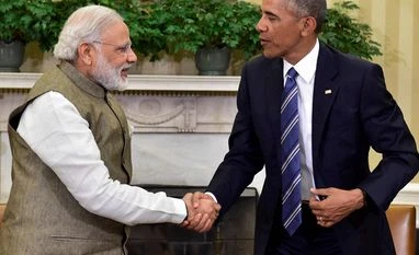 India set to contribute as new engine of global growth: Narendra Modi Prime Minister Narendra Modi shakes hands with US President Barack Obama during a meeting in the Oval Office of the White House. Photo: PTI