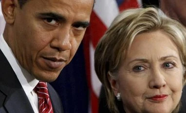 Hillary in FBI dock: Was money parked in Clinton Foundation as pay-to-play? File photo of Barack Obama and Hillary Clinton