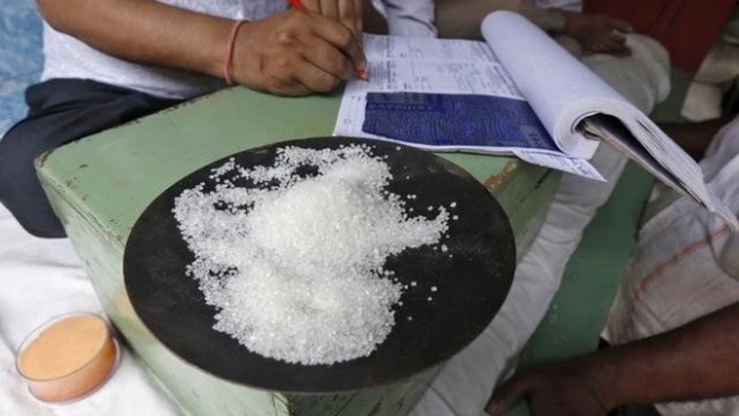A sample of sugar crystals are seen on the desk of a trader at a wholesale market in Kolkata A sample of sugar crystals are seen on the desk of a trader at a wholesale market in Kolkata