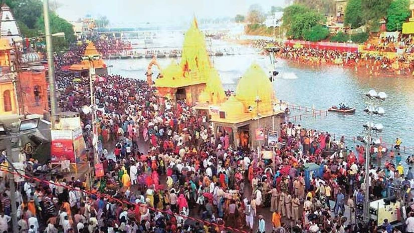 Devotees take a holy dip in the Kshipra during the Simhastha Maha Kumbh Mela in Ujjain, Madhya Pradesh, on May 6 | PHOTO: PTI Devotees take a holy dip in the Kshipra during the Simhastha Maha Kumbh Mela in Ujjain, Madhya Pradesh, on May 6 | PHOTO: PTI