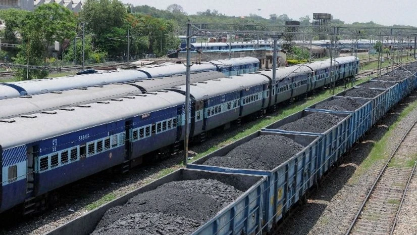 A goods train loaded with coal A goods train loaded with coal