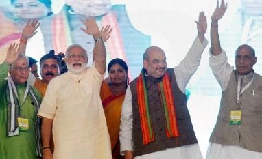 Road to Delhi in 2019 goes via UP 2017: Narendra Modi Prime Minister Narendra Modi with Union Minister Rjanath Singh, BJP President Amit Shah and other senior leaders during 'Parivartan Rally' at Parade Ground in Allahabad
