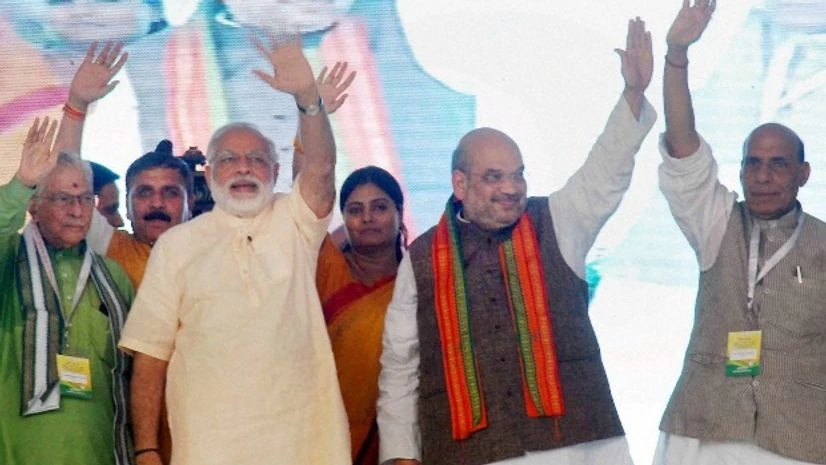 Prime Minister Narendra Modi with Union Minister Rjanath Singh, BJP President Amit Shah and other senior leaders during 'Parivartan Rally' at Parade Ground in Allahabad Prime Minister Narendra Modi with Union Minister Rjanath Singh, BJP President Amit Shah and other senior leaders during 'Parivartan Rally' at Parade Ground in Allahabad