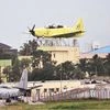 India's indigenous HTT-40 (Hindustan Turboprop Trainer), basic training aircraft flies during its inaugural flight at Hindustan Aeronautics Limited airport in Bengaluru on Friday Photo: PTI