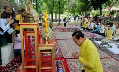 Thai PM offers prayers at Bodh Gaya Thailand Prime Minister Prayut Chan-o-cha, prays under the Sacred Bodhi Tree at Mahabodhi Temple in Bodhgaya. His wife Naraporn Chan-ochato is also seen. Photo: PTI