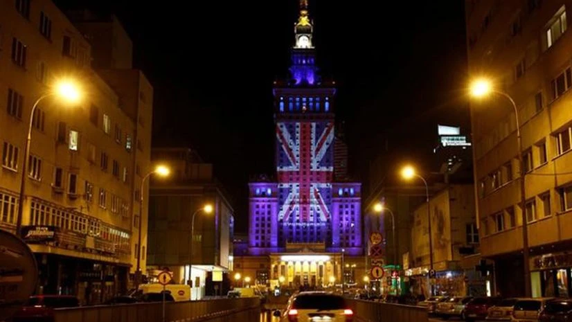 The Palace of Culture and Science is illuminated in Union Jack colours by Warsaw's capital authorities in support of Britain staying in the EU, in Warsaw, Poland. Photo: Reuters The Palace of Culture and Science is illuminated in Union Jack colours by Warsaw's capital authorities in support of Britain staying in the EU, in Warsaw, Poland. Photo: Reuters