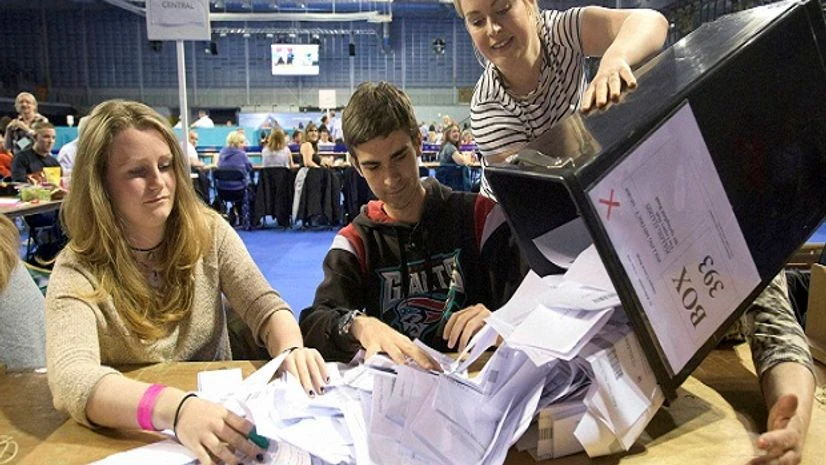 A ballot box is opened for counting at the Titanic Exhibition Centre in Belfast, Northern Ireland, as counting gets underway in the referendum on the UK membership of the European Union. Photo:AP/PTI A ballot box is opened for counting at the Titanic Exhibition Centre in Belfast, Northern Ireland, as counting gets underway in the referendum on the UK membership of the European Union. Photo:AP/PTI
