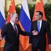 Russian President Vladimir Putin, left, walks with Chinese Premier Li Keqiang before a meeting in Beijing's Great Hall of the People on Saturday, June 25, 2016. AP/PTI