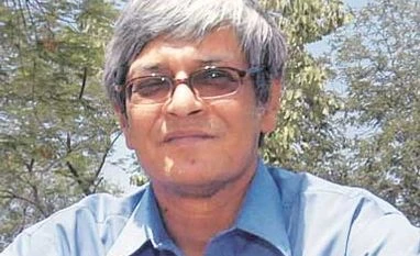 The merger is like a divorce, property needs to be separated: Bibek Debroy Bibek Debroy