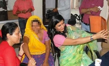 Rajasthan women commission member clicks selfie with rape victim Rajasthan women's panel member Somya Gurjar with alleged rape survivor in Jaipur