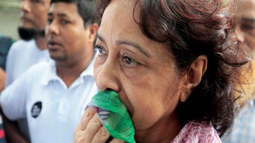 Hosne Ara Karim, whose son and daughter-in-law were rescued from the restaurant that was attacked by heavily armed militants, wait for them in Dhaka. Hosne Ara Karim, whose son and daughter-in-law were rescued from the restaurant that was attacked by heavily armed militants, wait for them in Dhaka.