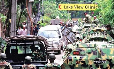 Two arrested in connection with Dhaka terror attack Bangladesh security personnel atop armoured vehicles after militants took hostages at a restaurant in Dhaka on Saturday. Forces stormed the Holey Artisan Bakery in Dhaka's Gulshan area, rescuing some captives at the end of 12-hour stand-off (PTI)