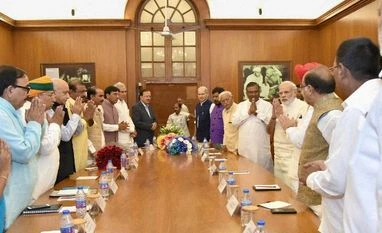 Modi tells new ministers, you've few hours to celebrate PM Modi with newly sworn in ministers in New Delhi