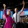 President Barack Obama and Democratic presidential candidate Hillary Clinton wave following a campaign event at the Charlotte Convention Centre in Charlotte, NC.