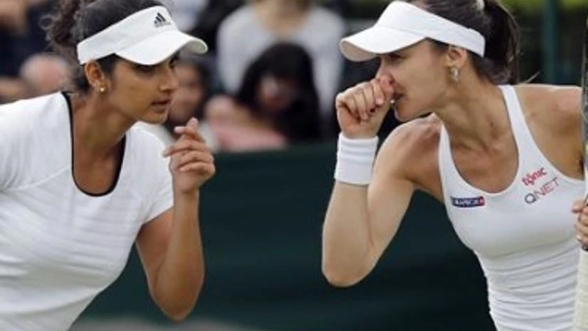 Wimbledon: Sania-Martina knocked out in quarters Wimbledon: Sania-Martina knocked out in quarters