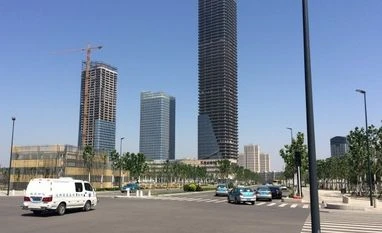 China inflation up 1.9% in June, slowest in 6 months Buildings under construction are seen at Yujiapu in Tianjin