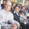 Apple's CEO Tim Cook , IPL Chairman Rajeev Shukla and actor Sanjay Dutt during a cricket match in Kanpur in May