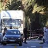 The truck which slammed into revelers is seen near the site of an attack in the French resort city of Nice, southern France.
