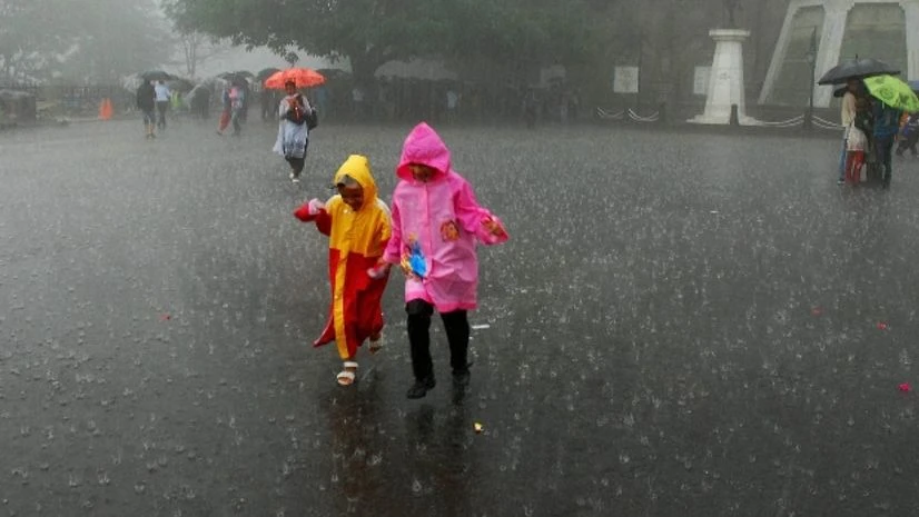 Children enjoy monsoon rains Children enjoy monsoon rains