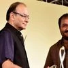 Finance Minister Arun Jaitley gives Lakshmipati Singhania-IIM Lucknow National Leadership Award to Anand Kumar, founder of Super 30 in New Delhi.