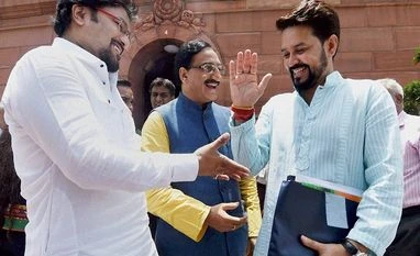 No directions to central universities to increase fees: HRD minister BJP MPs Anurag Thakur, Babul Supriyo and Ramesh Pokhriyal at Parliament house during the monsoon session in New Delhi.