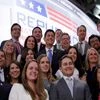 House Speaker Paul Ryan of Wis., centre, pose for a group picture on the stage before the second day session of the Republican National Convention in Cleveland on Tuesday
