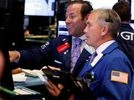 Traders work on the floor of the New York Stock Exchange (NYSE) shortly after the opening bell in New York Traders work on the floor of the New York Stock Exchange (NYSE) shortly after the opening bell in New York