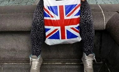 No other countries will quit EU after Britain: Jean-Claude Juncker A woman holds a Union Flag shopping bag in London Reuters
