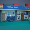 Federal Bank shares crack 5% as analysts cut target; should you sell? Federal Bank net profit up 18%
