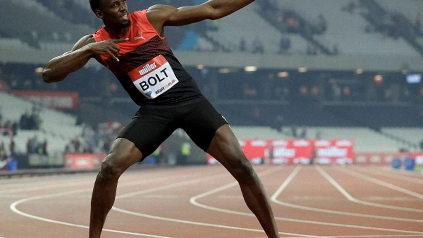 Usain Bolt of Jamaica poses for photographers after he won the men's 200 meter race during the Diamond League anniversary games at The Stadium, in the Queen Elizabeth Olympic Park in London. Usain Bolt of Jamaica poses for photographers after he won the men's 200 meter race during the Diamond League anniversary games at The Stadium, in the Queen Elizabeth Olympic Park in London.