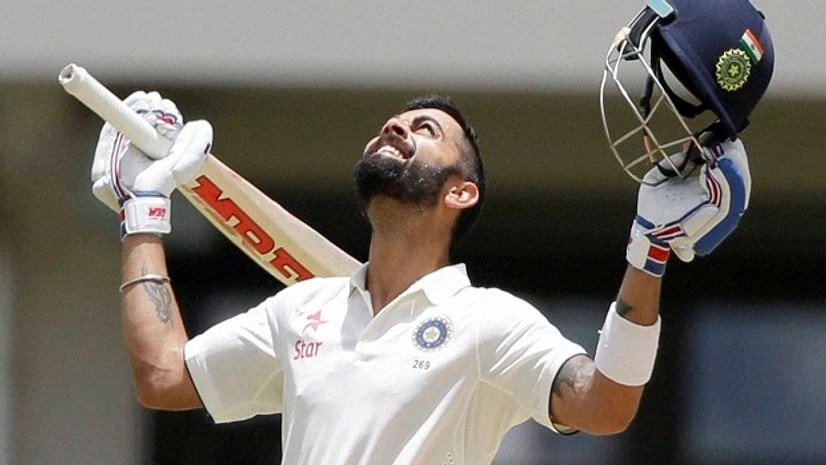 Indian skipper Virat Kohli celebrates after scoring a double-century during day two of the 1st cricket Test match against West Indies at the Sir Vivian Richards Stadium in North Sound, Antigua. Indian skipper Virat Kohli celebrates after scoring a double-century during day two of the 1st cricket Test match against West Indies at the Sir Vivian Richards Stadium in North Sound, Antigua.